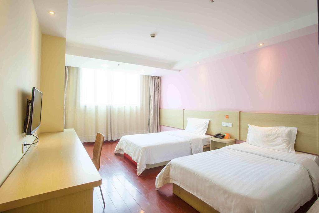 7 Days Inn Meizhou Jiangnan Kedu Commercial Plaza Room photo