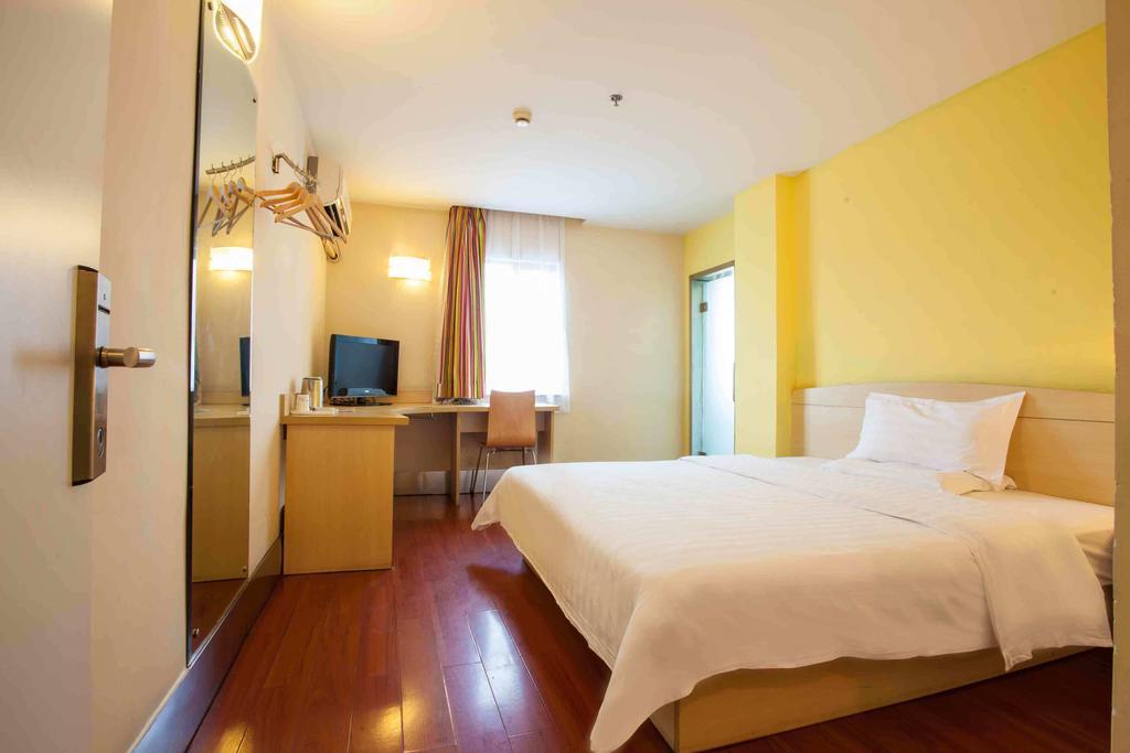 7 Days Inn Meizhou Jiangnan Kedu Commercial Plaza Room photo